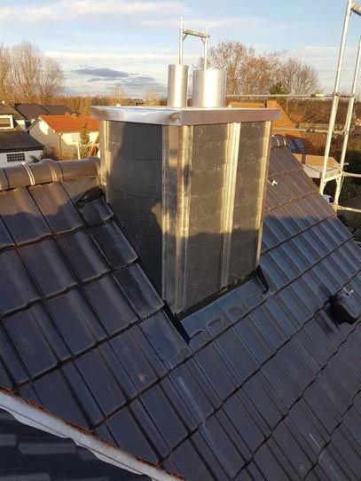 Referenzen Kamin 01 Gross Spenglerei Kaminverkleidung Dachbau Bossert