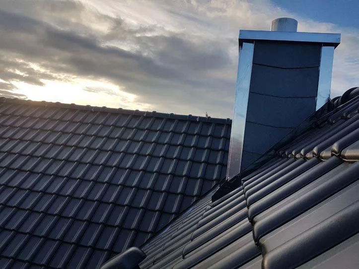 Referenzen Kamin 06 Gross Spenglerei Kaminverkleidung Dachbau Bossert