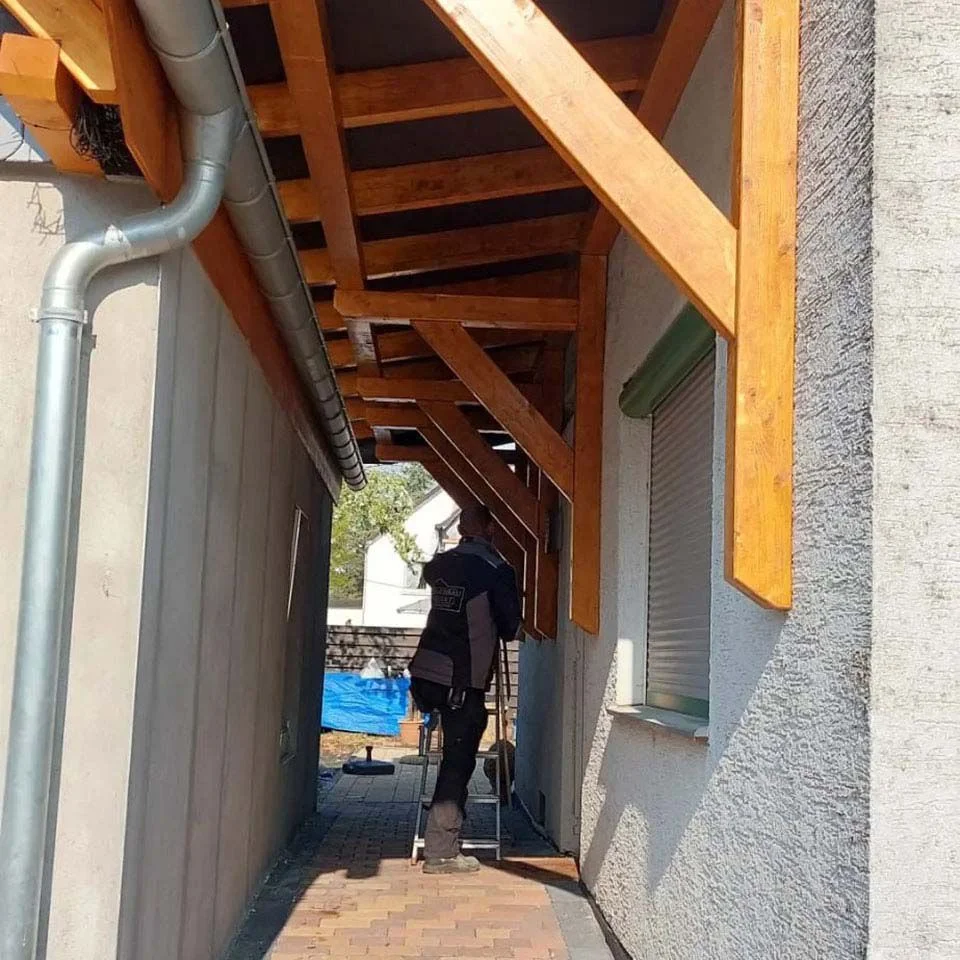 Referenzen Holzbau 0205 01 Holzbau Entstehung Eingangsueberdachung Dachbau Bossert